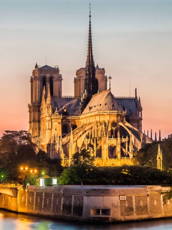notre dame de paris and the seine by night river France