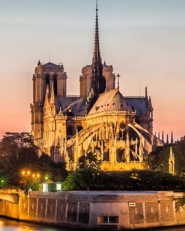 notre dame de paris and the seine by night river France